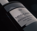 A closeup of Mind Games luxury perfume brands' Grand Master fragrance bottle.